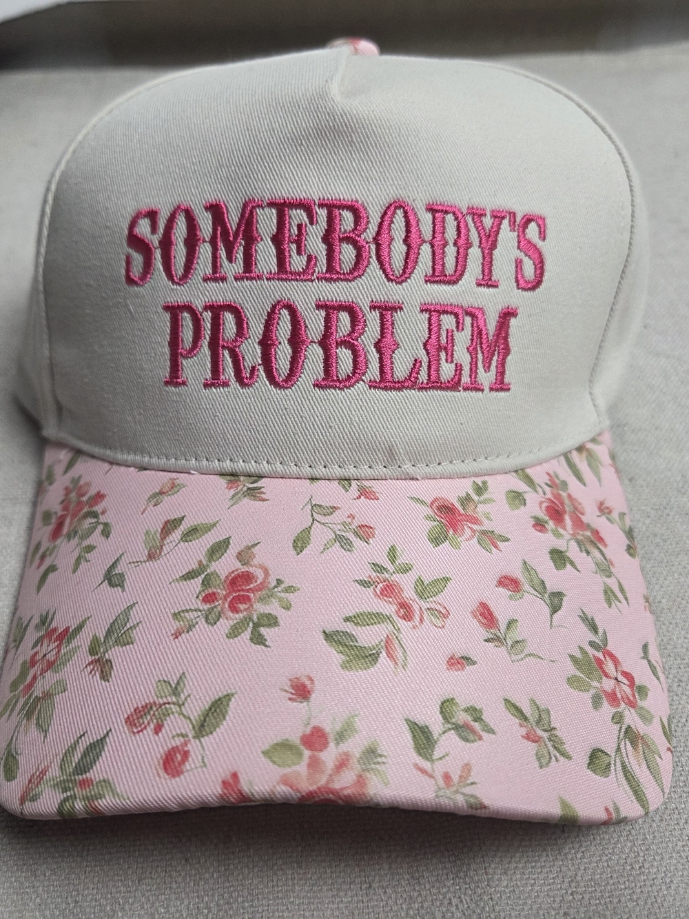 Source Unknown Pink & Cream Floral "SOMEBODY'S PROBLEM" Baseball Cap